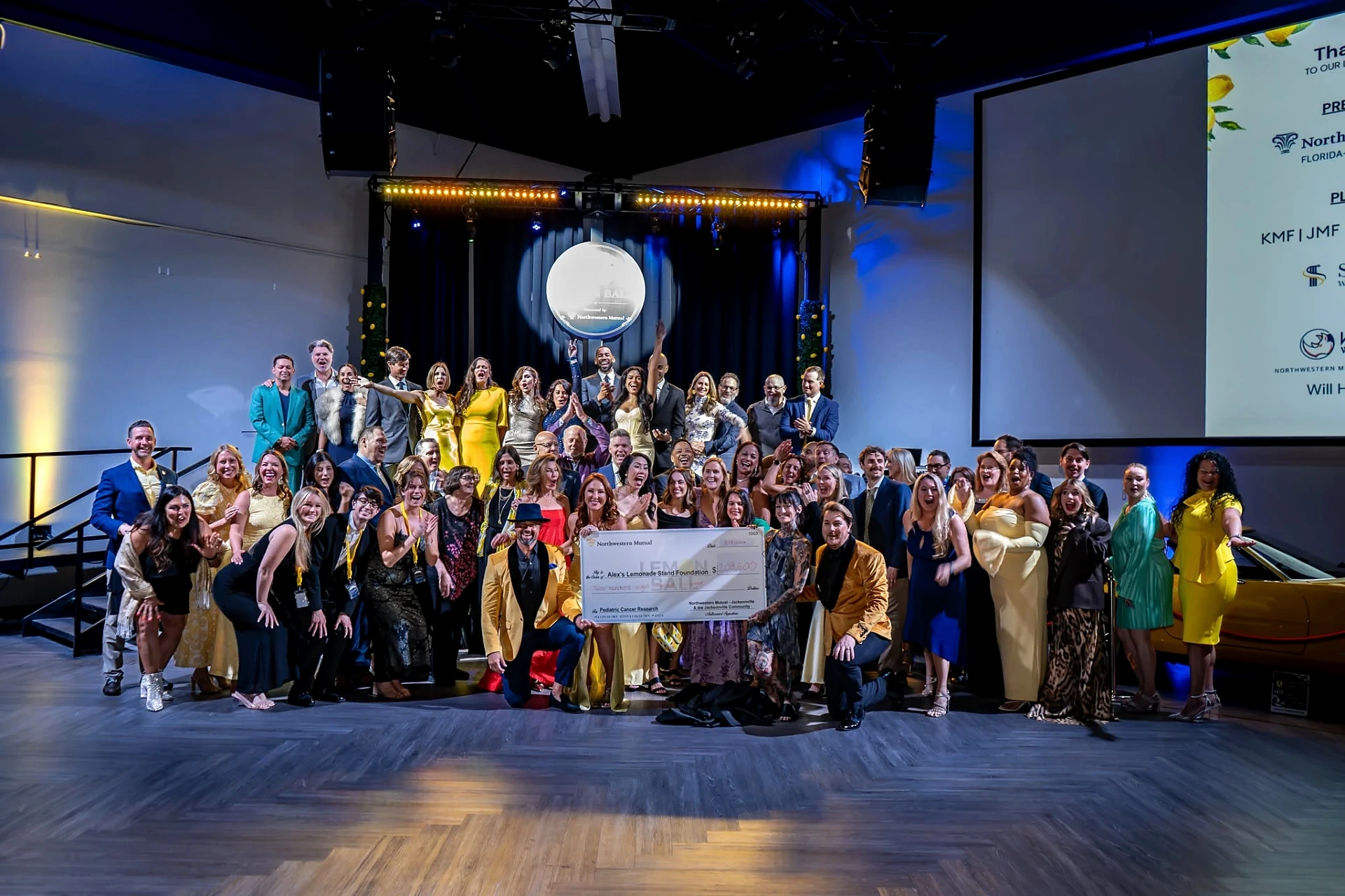 Live fundraising moment on the Lemon Ball stage